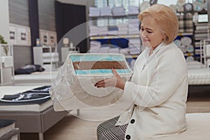 Senior woman shopping at furnishings store