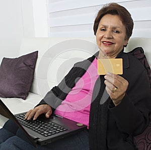 Senior woman shopping on internet