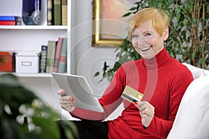 Senior woman shopping online