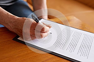 Senior woman signature document