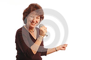 senior woman singing Microphone in hand