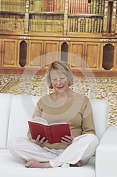 senior woman sitting in the living room