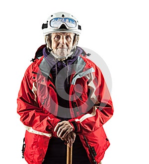 Senior woman in ski jacket and helmet over white