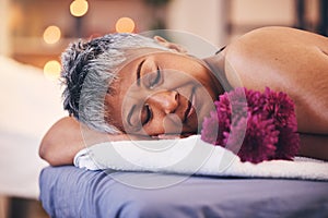 Senior, woman and sleeping face on massage bed for luxury, wellness and beauty treatment. Spa, relaxation and calm
