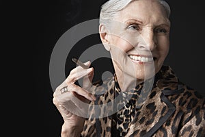 Senior Woman Smoking Cigarillo