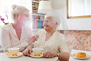 Senior woman spending quality time with her daughter