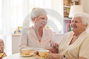 Senior woman spending quality time with her daughter