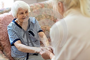 Senior woman spending quality time with her daughter