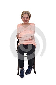 Senior woman standing  on white background