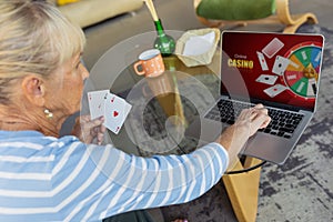 Senior woman studying at home, getting online courses