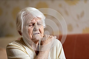 Senior woman suffering from back pain