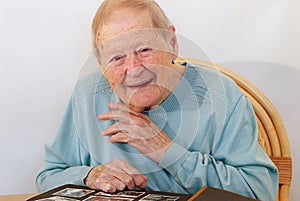 Senior woman telling above her life photo