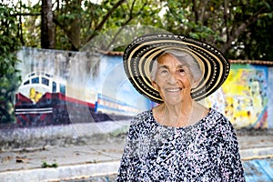 Senior woman tourist at the Macondo Linear Park in Aracataca the birthplace of Nobel Prize Gabriel Garcia Marquez