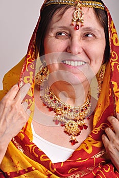 Senior woman in traditional Indian clothing and jeweleries