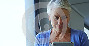 Senior woman using digital tablet 4k