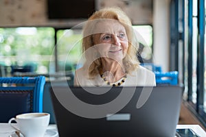 Senior Woman Using Laptop Computer