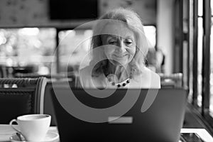 Senior Woman Using Laptop Computer