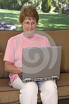 Senior Woman Using Laptop Computer