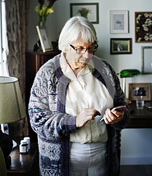 A senior woman using smartphone