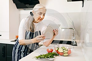 Senior Woman Using Tablet