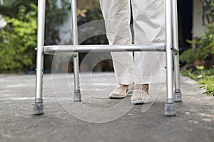 Senior woman using a walker