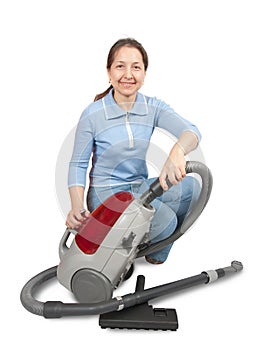 Senior Woman with Vacuum Cleaner