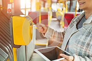 Senior woman validating a ticket