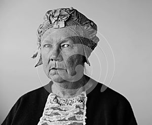 Senior woman with a vintage hat