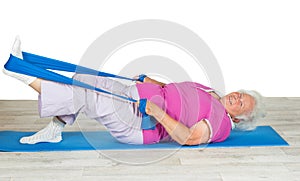 Senior woman with vitality exercising photo