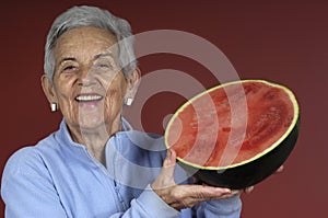 Senior woman with watermelon