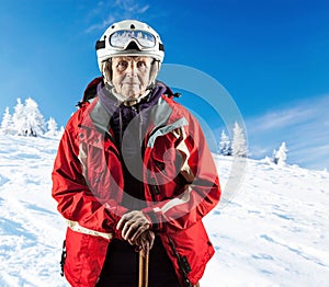 Senior woman wearing ski jacket on snowy slope