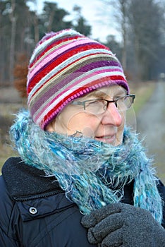 Senior woman in winter clothes