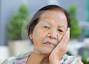 Senior woman with worried stressed face