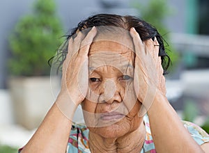 Senior woman with worried stressed face