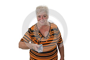 Senior woman zapping with remote control