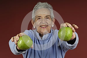 Senior womanwith apple