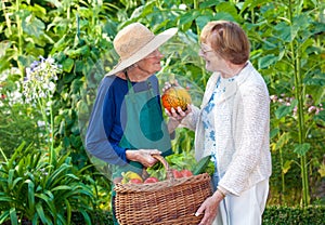 Senior Women at the Farm With Basket of Veggies.