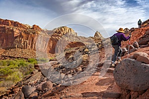 Senior Women Hiking the Cohab Canyon Trail in the Capitol Reef National Park.