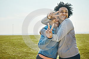 Senior, women hug and fitness, peace hand sign and portrait with friends, energy and playful outdoor. Happy female