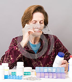 Senior Women Managing Her Medication photo