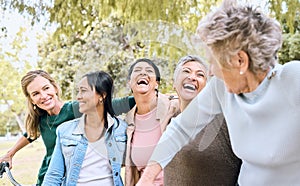 Senior women, park and friends laughing at funny joke, crazy meme or comedy outdoors. Comic, happy or group of retired