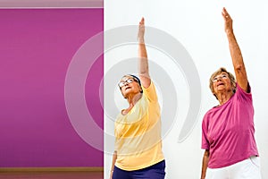 Senior women stretching in gym. photo