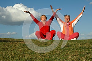 Senior women yoga outdoors