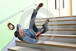 Senior Worker Falling on Stairs