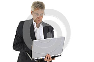 Senior working with laptop