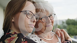 Senior and young woman hugging each other. Grandmother and granddaughter bonding