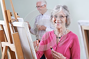 Seniors Attending Painting Class Together