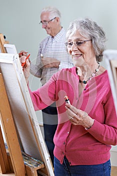 Seniors Attending Painting Class Together