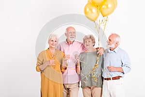 Seniors celebrating birthday in room