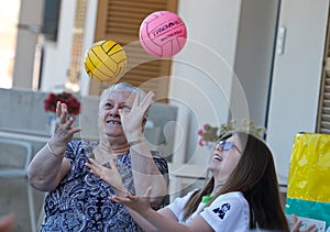 Seniors and childs during therapeutical activities on a nursing home in Mallorca